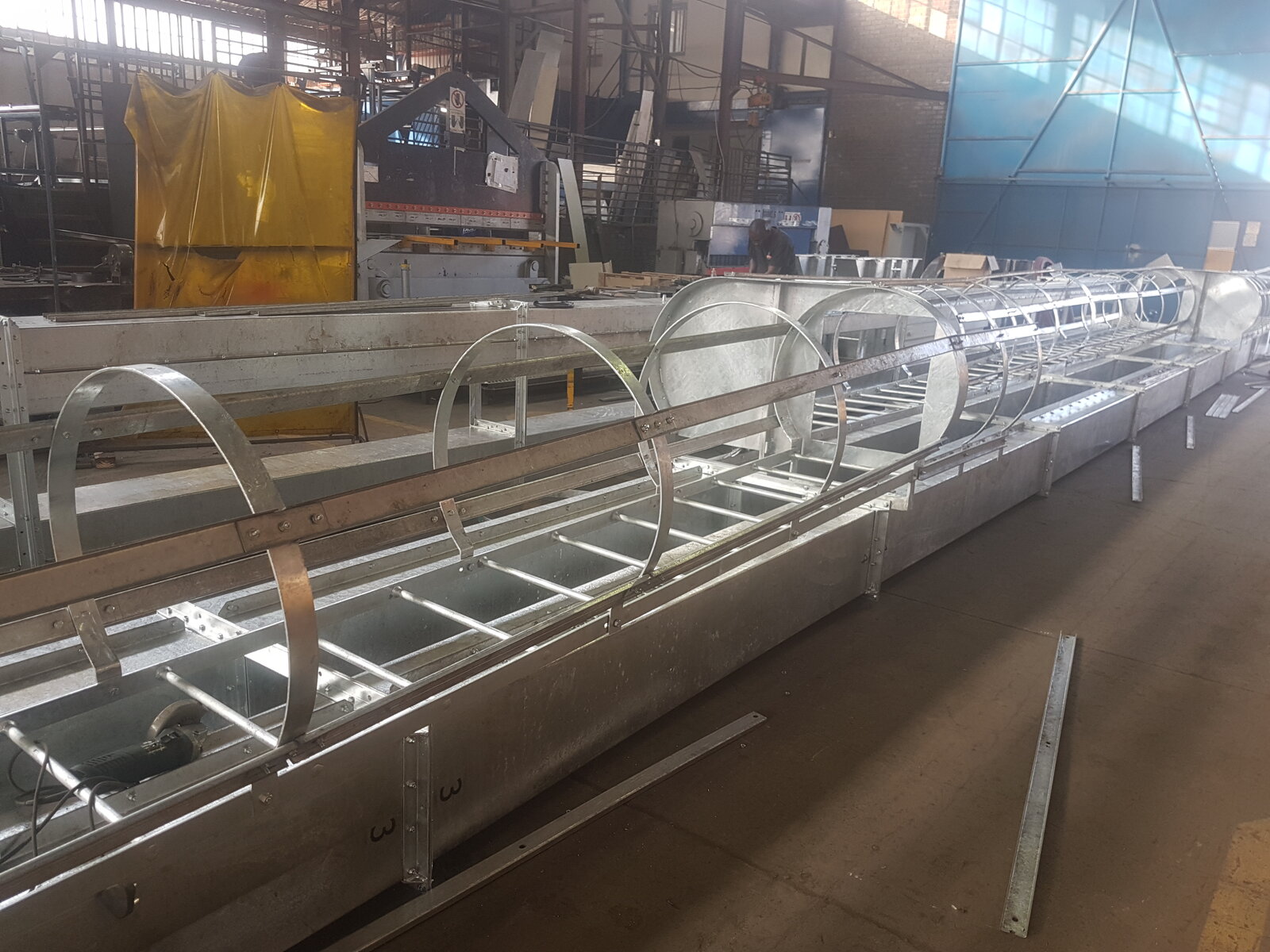 Belt conveyor system in a processing plant
