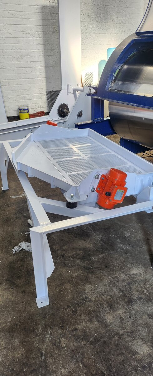 Vibratory feeder at a client installation by Facet Engineering