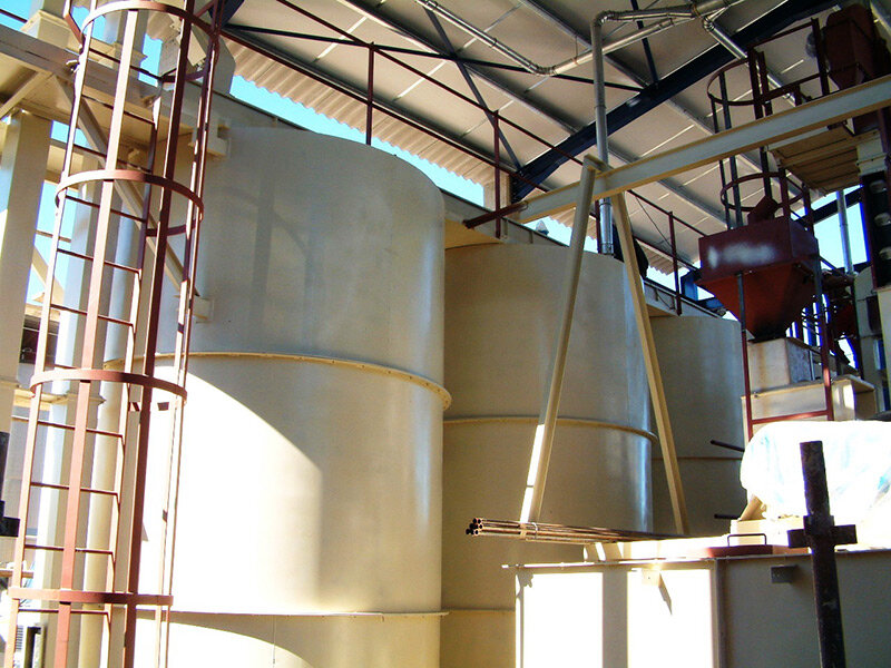 Storage bins with intake conveying system