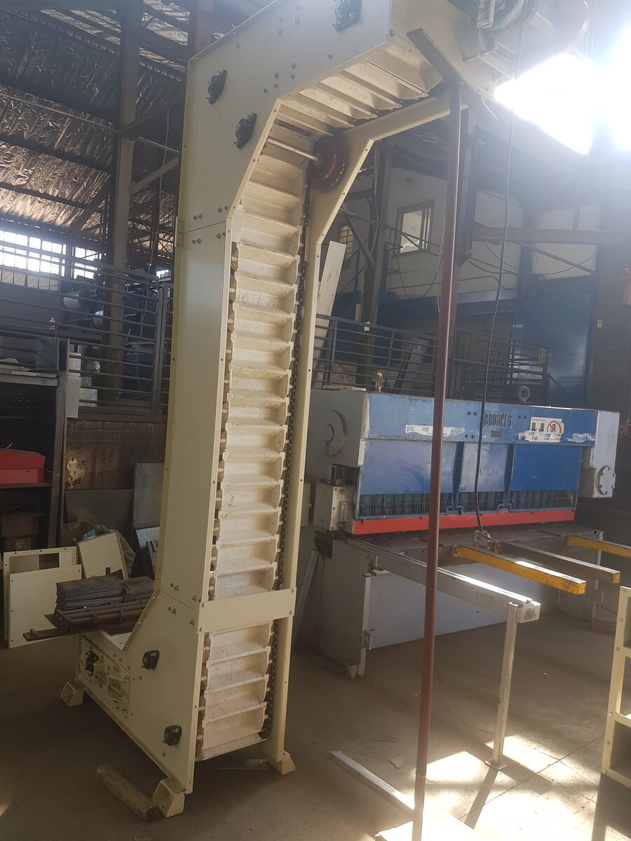 Swing tray elevator installation by Facet Engineering